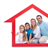 Four people—two adults and two children—stand close together inside a red house-shaped frame, symbolizing family sheltering at home.